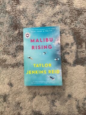 Malibu Rising by Taylor Jenkins Reid - Teal & Yellow Paperback